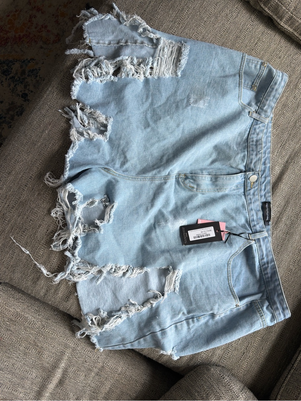 PrettyLittleThing Light Blue Distressed Denim Shorts